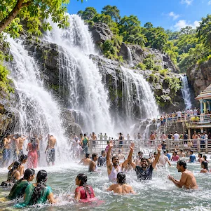 Courtallam Kutralam Tamil Nadu waterfalls surrounded by lush green Western Ghats landscape